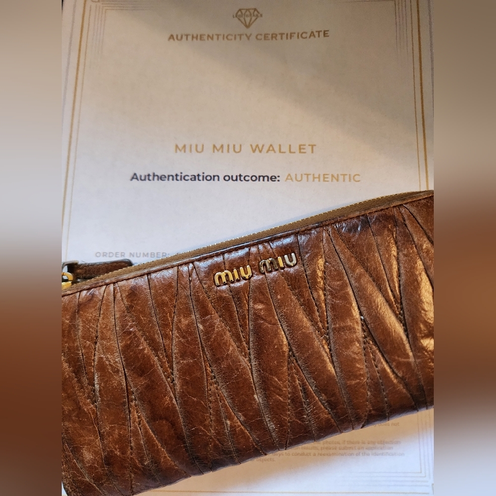 Preowned Miu Miu brown wallet with‎ COA